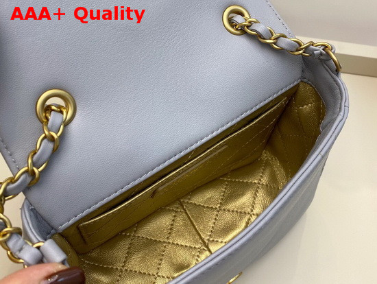 Chanel Mini Flap Bag in Light Blue with Charm Logo on the Front Replica