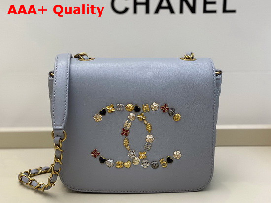 Chanel Mini Flap Bag in Light Blue with Charm Logo on the Front Replica