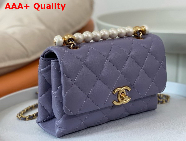 Chanel Mini Flap Bag with Top Handle Light Purple Shiny Lambskin Imitation Pearls Gold Tone Metal AS5001 Replica