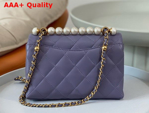 Chanel Mini Flap Bag with Top Handle Light Purple Shiny Lambskin Imitation Pearls Gold Tone Metal AS5001 Replica