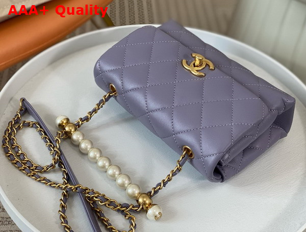 Chanel Mini Flap Bag with Top Handle Light Purple Shiny Lambskin Imitation Pearls Gold Tone Metal AS5001 Replica