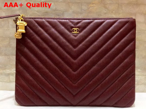 Chanel Pouch in Burgundy Grained Lambskin with Charms Replica