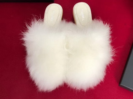 Chanel Shearling Mules in White