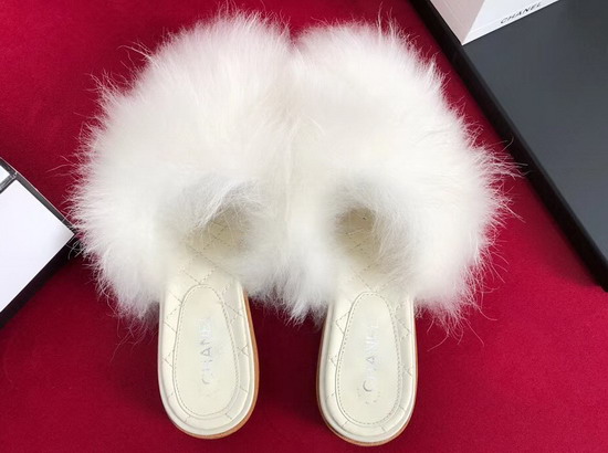 Chanel Shearling Mules in White