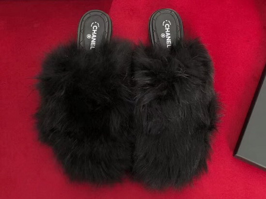 Chanel Shearling Sheepskin Mules in Black