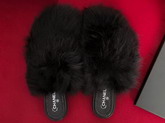 Chanel Shearling Sheepskin Mules in Black