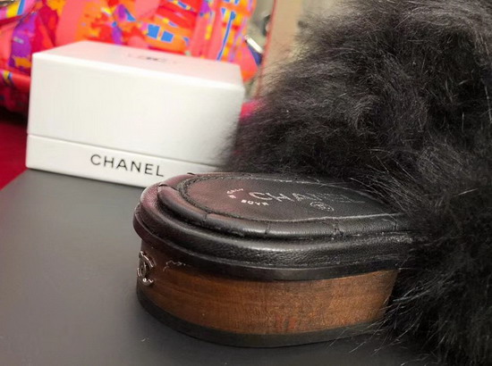 Chanel Shearling Sheepskin Mules in Black