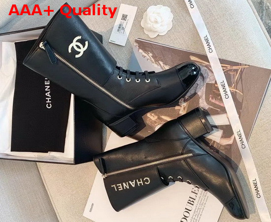 Chanel Short Boots in Black Calfskin and Patent Calfskin Metal Chanel Logo Replica