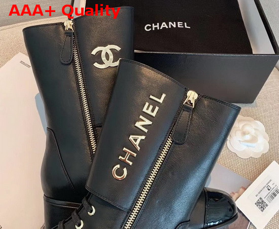 Chanel Short Boots in Black Calfskin and Patent Calfskin Metal Chanel Logo Replica