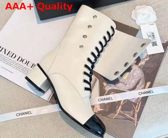 Chanel Short Boots in White Calfskin and Patent Calfskin Metal Chanel Logo Replica