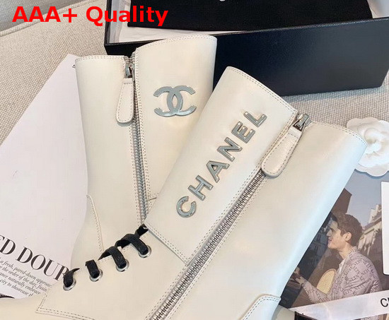 Chanel Short Boots in White Calfskin and Patent Calfskin Metal Chanel Logo Replica