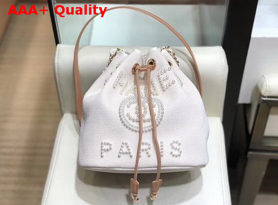 Chanel Small Drawstring Bag in Beige Canvas and Pearls Replica