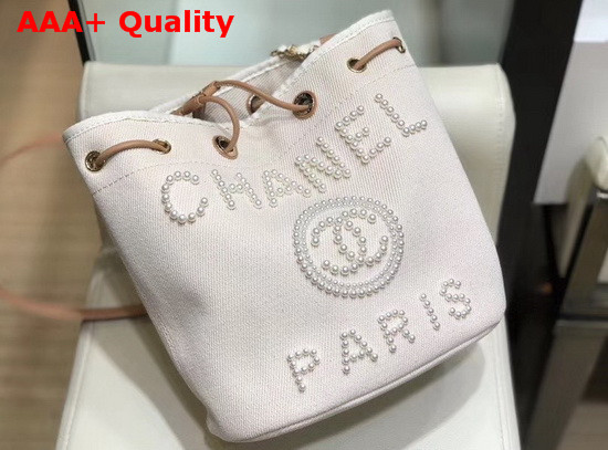 Chanel Small Drawstring Bag in Beige Canvas and Pearls Replica