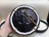 Chanel Small Round Bag Crumpled Calfskin Cotton and Gold Tone Metal AS0075 Black and White