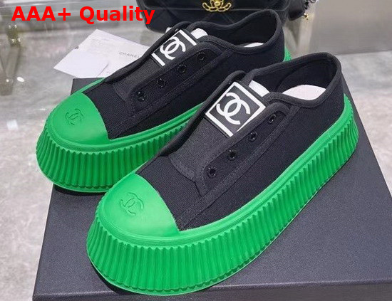 Chanel Sneaker in Black Canvas with Green Rubber Sole Replica