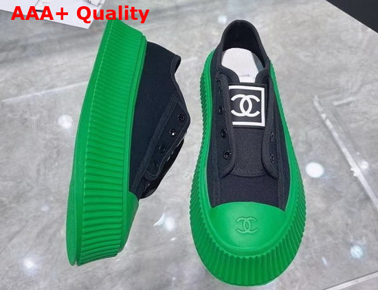 Chanel Sneaker in Black Canvas with Green Rubber Sole Replica