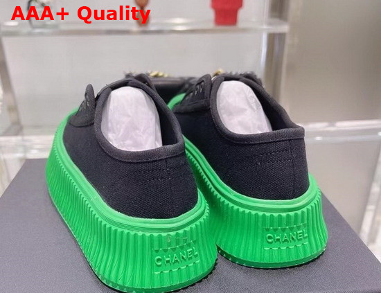 Chanel Sneaker in Black Canvas with Green Rubber Sole Replica