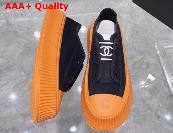 Chanel Sneaker in Black Canvas with Orange Rubber Sole Replica