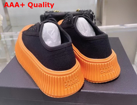 Chanel Sneaker in Black Canvas with Orange Rubber Sole Replica