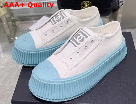 Chanel Sneaker in White Canvas with Light Blue Rubber Sole Replica