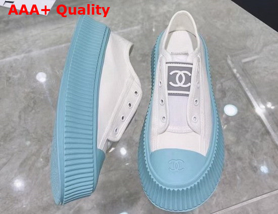 Chanel Sneaker in White Canvas with Light Blue Rubber Sole Replica