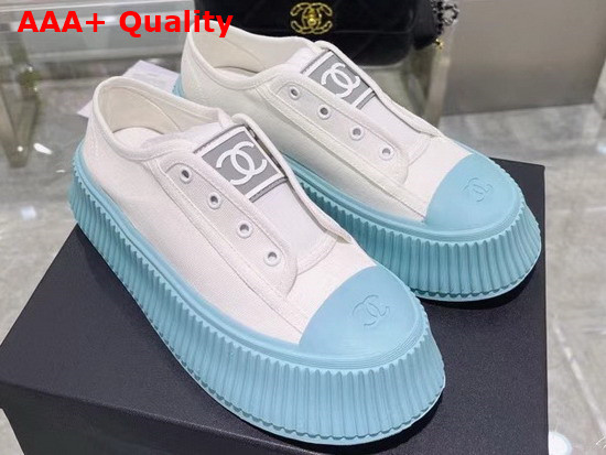 Chanel Sneaker in White Canvas with Light Blue Rubber Sole Replica