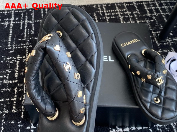 Chanel Thong Sandal in Black Lambskin Embellished with Gold Chanel Metal Flowers Replica