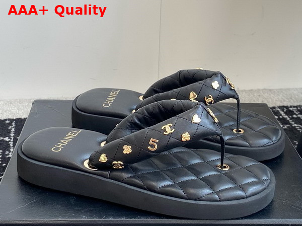 Chanel Thong Sandal in Black Lambskin Embellished with Gold Chanel Metal Flowers Replica