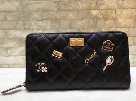 Chanel Zipped Wallet in Black Lambskin with Charms