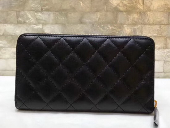 Chanel Zipped Wallet in Black Lambskin with Charms