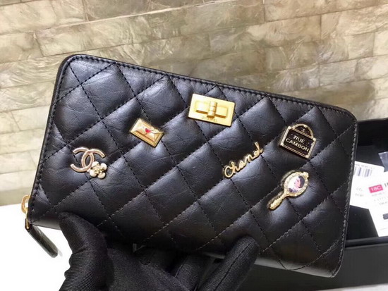 Chanel Zipped Wallet in Black Lambskin with Charms