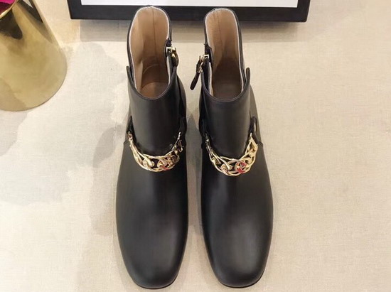 Gucci Black Leather Ankle Boot Decorated with Gold Chain