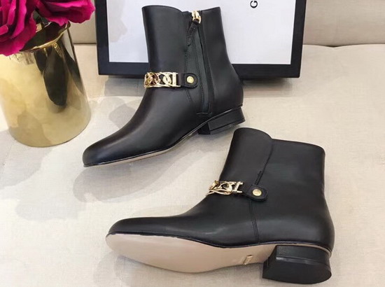 Gucci Black Leather Ankle Boot Decorated with Gold Chain