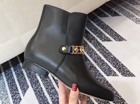 Gucci Black Leather Ankle Boot Decorated with Gold Chain