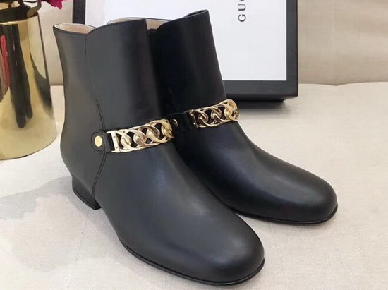 Gucci Black Leather Ankle Boot Decorated with Gold Chain