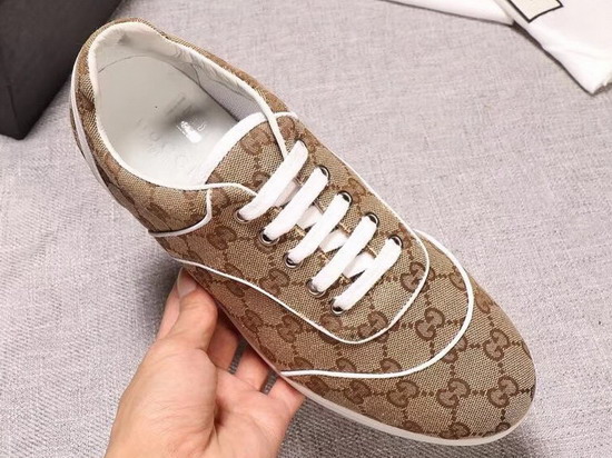 Gucci GG Canvas Sneaker in Brown