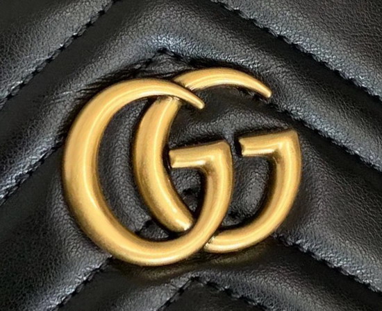 Gucci GG Marmont Mini Backpack in Black Matelasse Chevron Leather with a Heart on The Back 598594