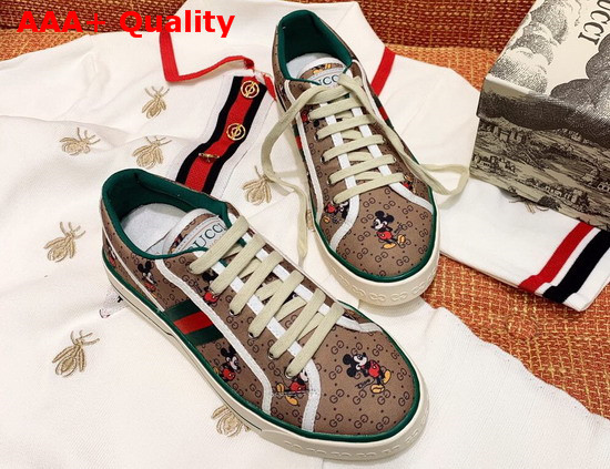 Gucci Womens Disney X Gucci Tennis 1977 Sneaker with Web Beige and Ebony Mini GG Canvas with Mickey Mouse Print 606110 Replica