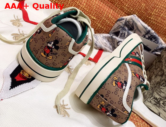 Gucci Womens Disney X Gucci Tennis 1977 Sneaker with Web Beige and Ebony Mini GG Canvas with Mickey Mouse Print 606110 Replica