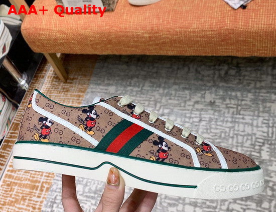 Gucci Womens Disney X Gucci Tennis 1977 Sneaker with Web Beige and Ebony Mini GG Canvas with Mickey Mouse Print 606110 Replica