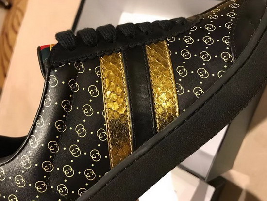 Womens Gucci Dapper Dan Sneaker in Black GG Leather with Gold and Black Web