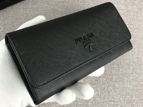 Prada Large Saffiano Leather Flap Wallet in Black with Metal Prada Lettering in the Same Tone