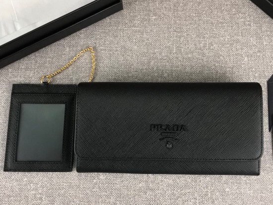 Prada Large Saffiano Leather Flap Wallet in Black with Metal Prada Lettering in the Same Tone