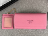 Prada Large Saffiano Leather Flap Wallet in Pink with Metal Prada Lettering in the Same Tone