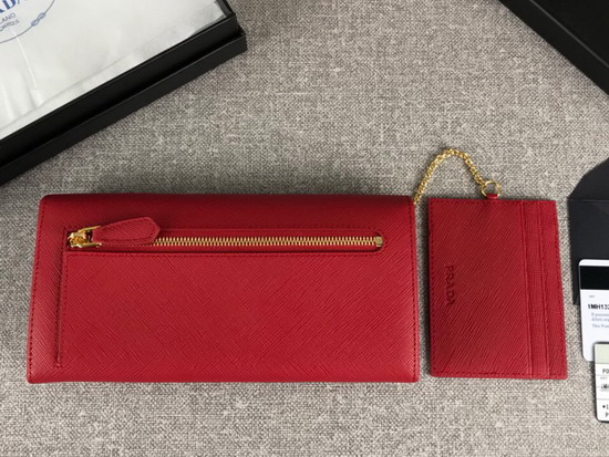 Prada Large Saffiano Leather Flap Wallet in Red with Metal Prada Lettering in the Same Tone