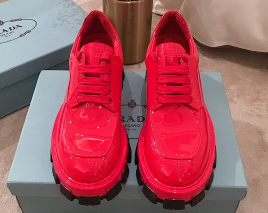 Prada Monolith Patent Leather Derby Shoes in Red