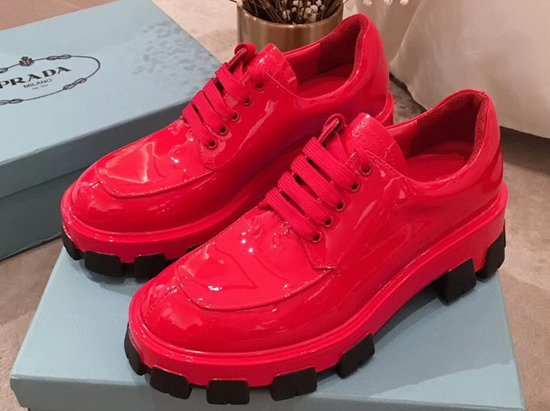 Prada Monolith Patent Leather Derby Shoes in Red