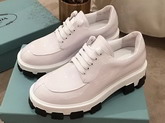 Prada Monolith Patent Leather Derby Shoes in White