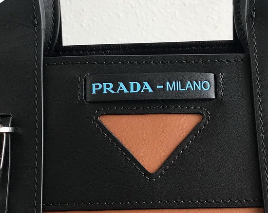 Prada Ouverture Medium Leather Bag Brown Calf Leather Contrasting Black Calf Leather Trim