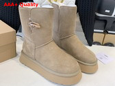 UGG Bailey Horn Buckle Snow Boot in Sand Sheepskin Replica